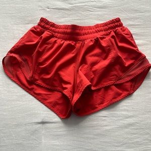 LULULEMON carnation red shorts.